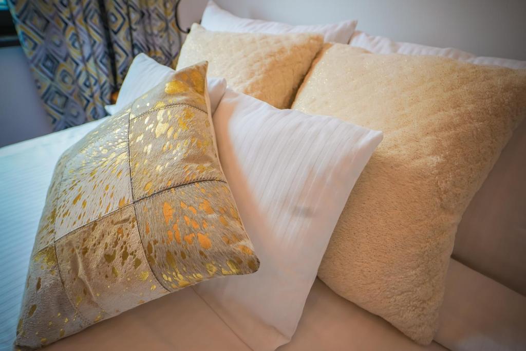 Postel nebo postele na pokoji v ubytování Lemmas Apartament Anchoria