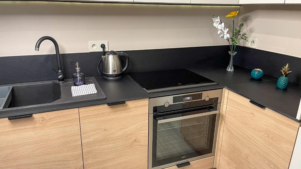 Kuchyňa alebo kuchynka v ubytovaní Comfortable 1-room apartment close to the center