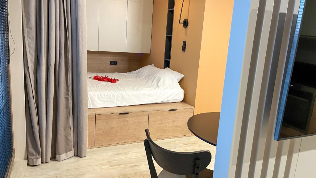 Posteľ alebo postele v izbe v ubytovaní Comfortable 1-room apartment close to the center