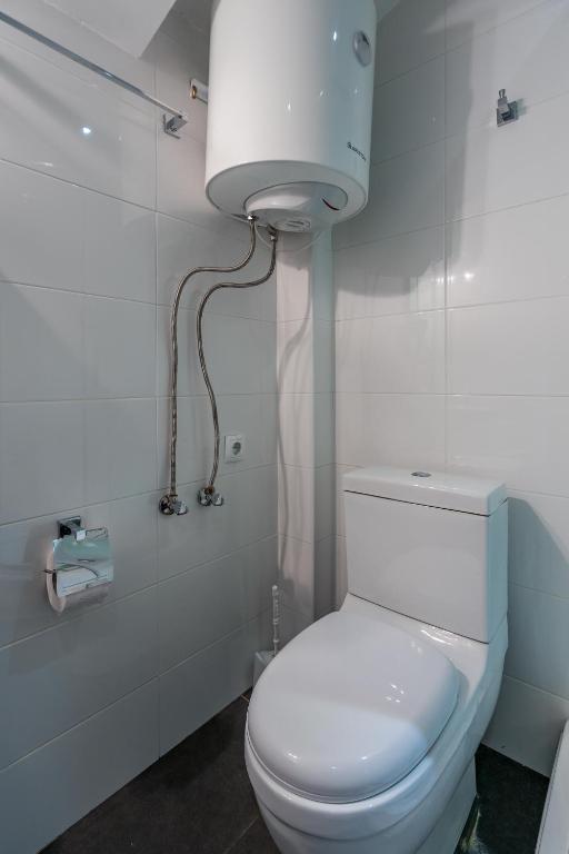 Koupelna v ubytování 2-room Apartment NFT Gudauri 303