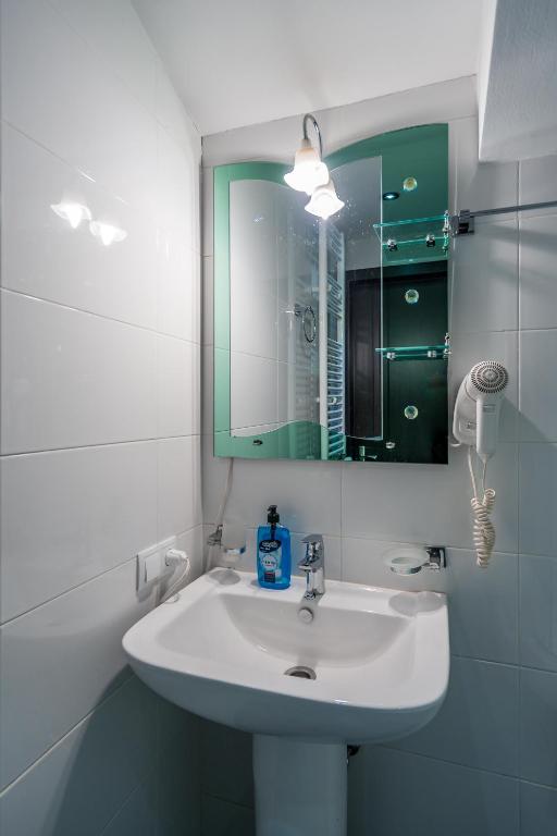 Koupelna v ubytování 2-room Apartment NFT Gudauri 303