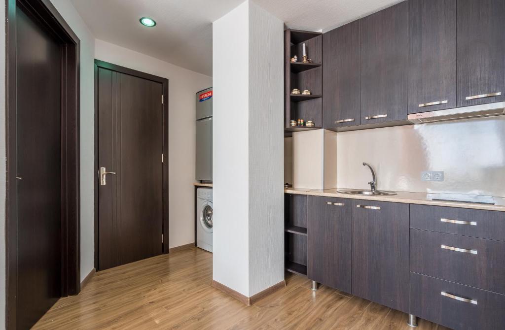 Kuchyň nebo kuchyňský kout v ubytování 2-room Apartment NFT Gudauri 303