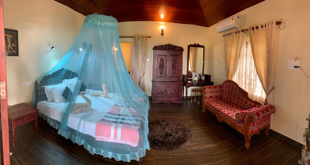 Postel nebo postele na pokoji v ubytování Kerala cottage