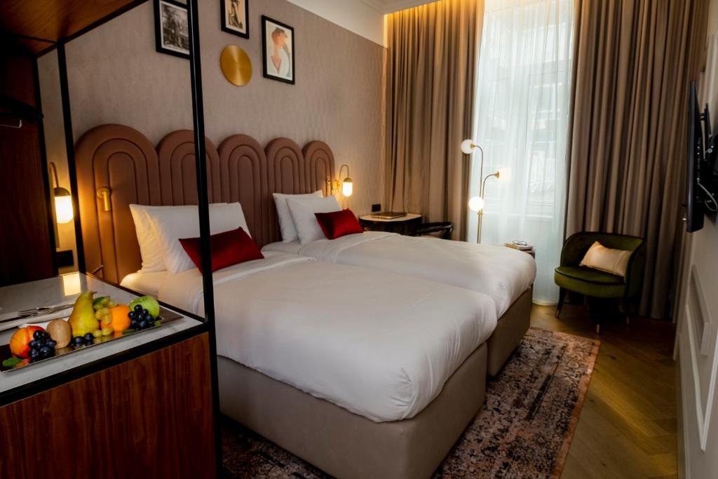 Postel nebo postele na pokoji v ubytování Hotel Indigo Belgrade by IHG