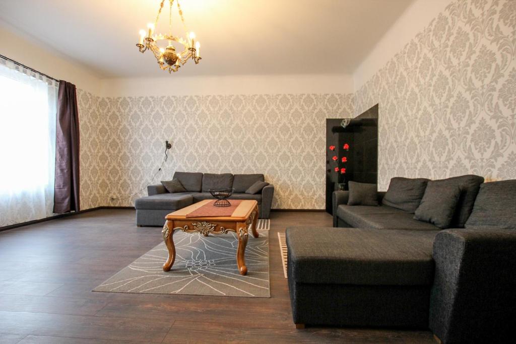 Posezení v ubytování Chelsea Roosi 11 Apartment