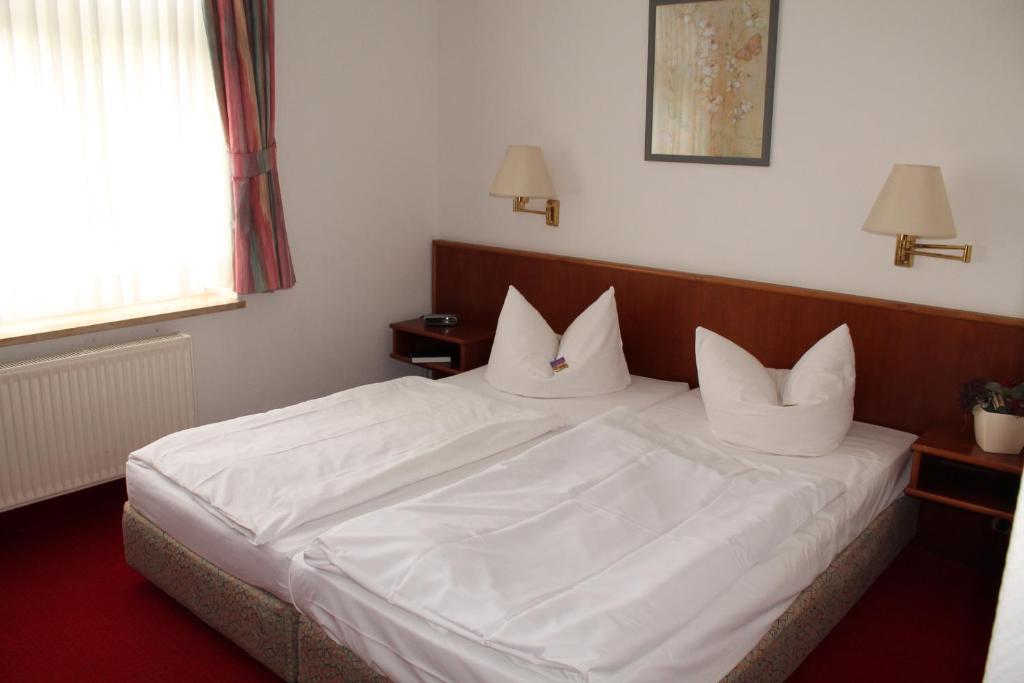 Postel nebo postele na pokoji v ubytování Hotel Fürsteneck