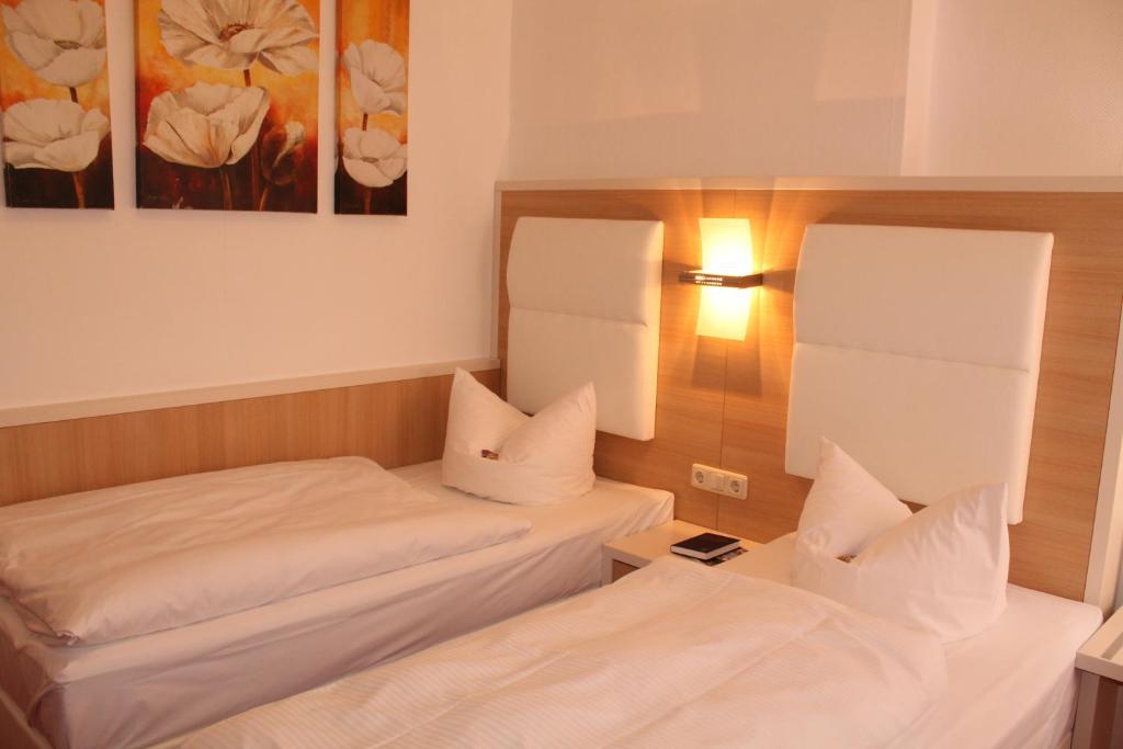 Postel nebo postele na pokoji v ubytování Hotel Fürsteneck