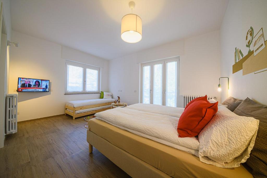 Postel nebo postele na pokoji v ubytování Alessia' s Home