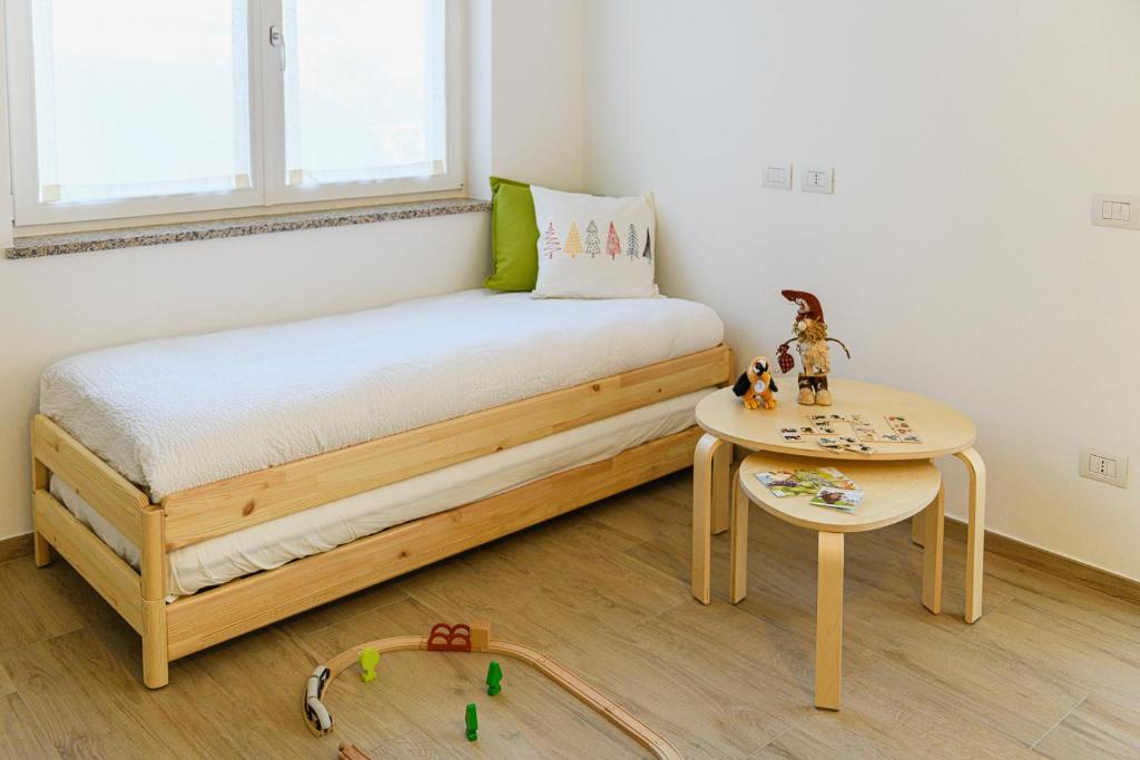 Postel nebo postele na pokoji v ubytování Alessia' s Home