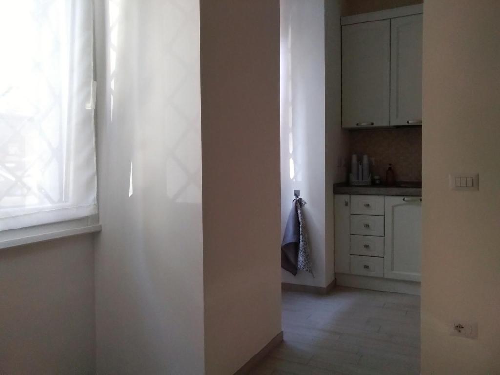 Kuchyňa alebo kuchynka v ubytovaní La Casa di Ludovica all'Appio Latino