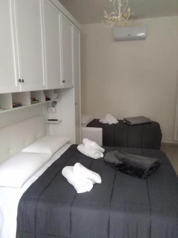 Posteľ alebo postele v izbe v ubytovaní La Casa di Ludovica all'Appio Latino