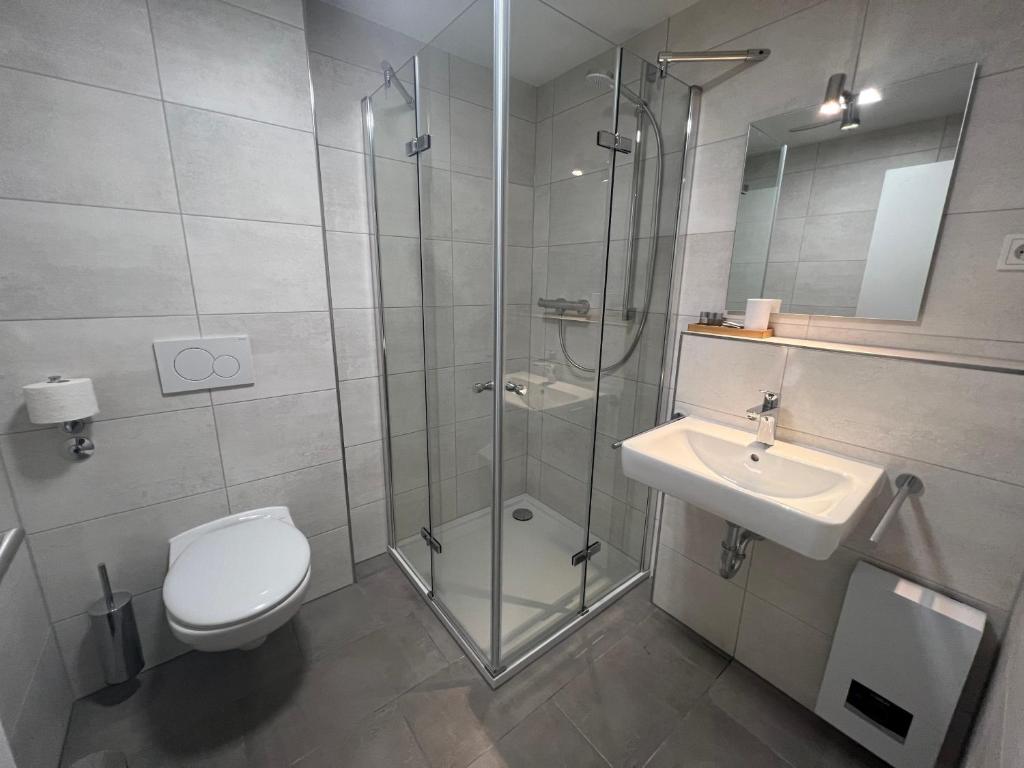 Koupelna v ubytování Hotel am Rathaus Adii
