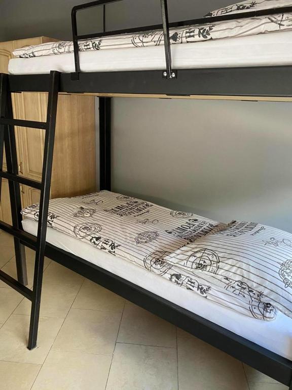 Posteľ alebo postele v izbe v ubytovaní Pokoje Duchówka