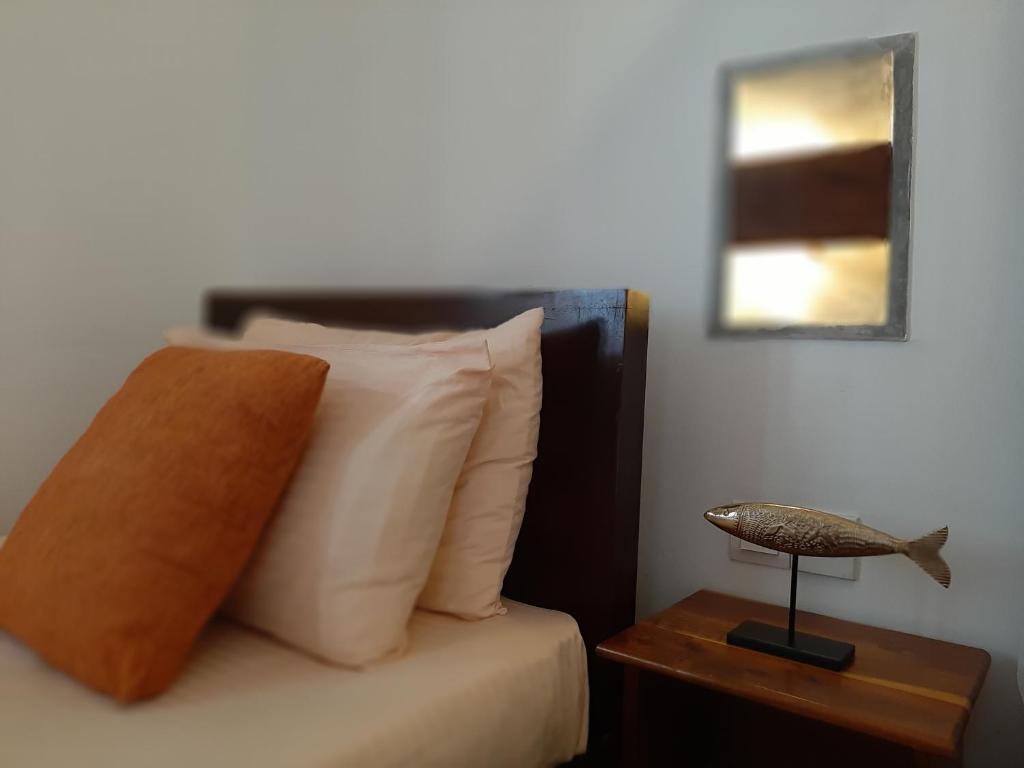 Postel nebo postele na pokoji v ubytování Weligama Ocean Breeze