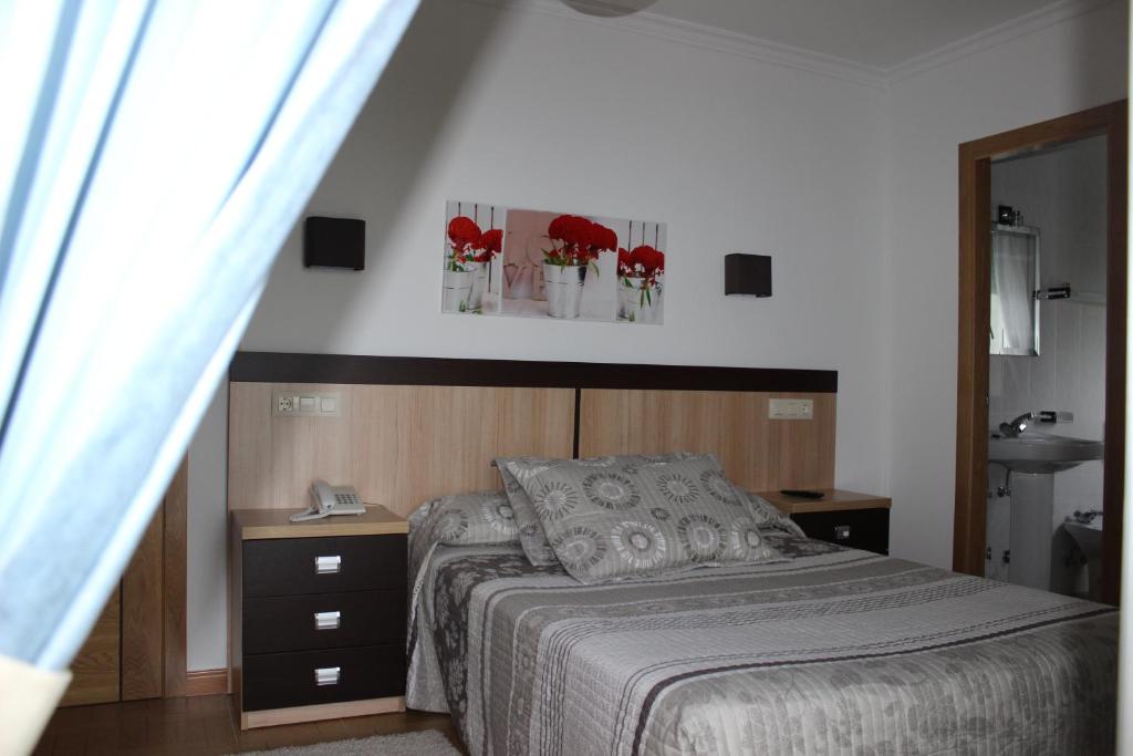 Postel nebo postele na pokoji v ubytování Hotel Estrella del Mar