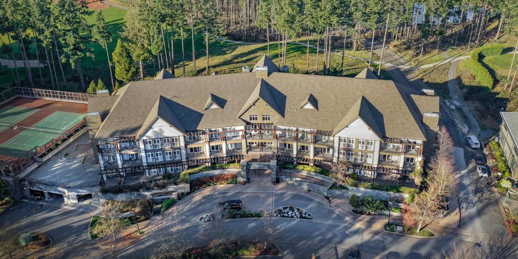an aerial view of a resort with a large building at Fairways Hotel on the Mountain in Victoria