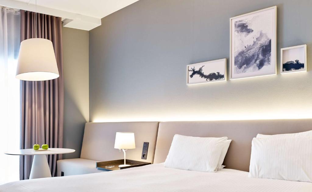 Postel nebo postele na pokoji v ubytování Van der Valk Hotel Spa