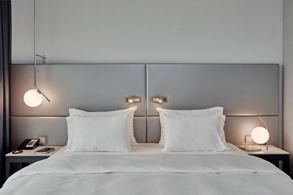 Postel nebo postele na pokoji v ubytování Radisson Blu Hotel Hannover