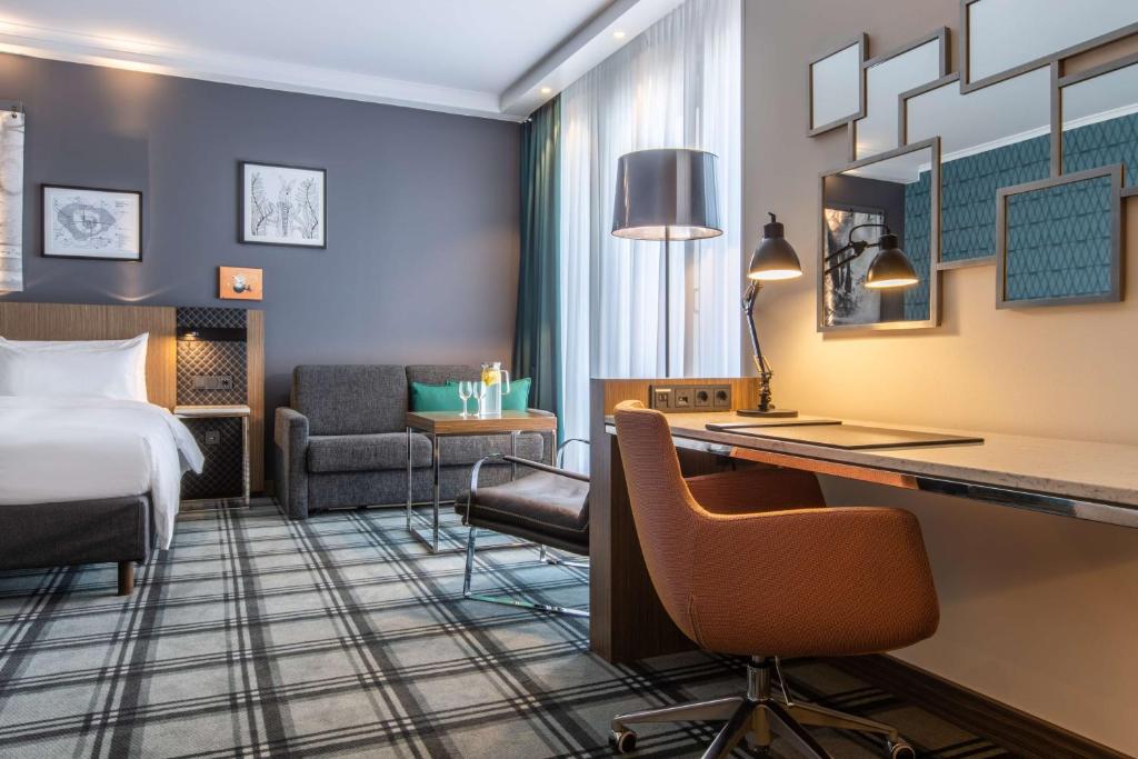 Postel nebo postele na pokoji v ubytování Radisson Blu Hotel Hannover