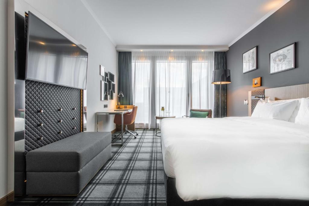Postel nebo postele na pokoji v ubytování Radisson Blu Hotel Hannover