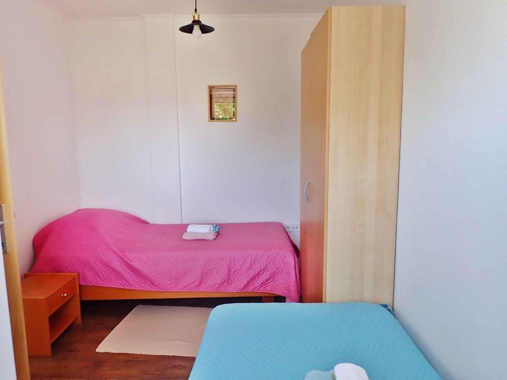 Posteľ alebo postele v izbe v ubytovaní Apartment in Starigrad-Paklenica 41710