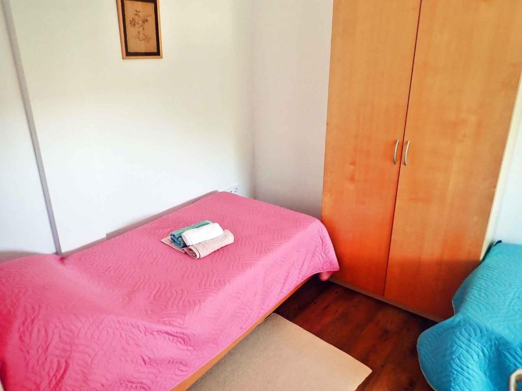 Posteľ alebo postele v izbe v ubytovaní Apartment in Starigrad-Paklenica 41710