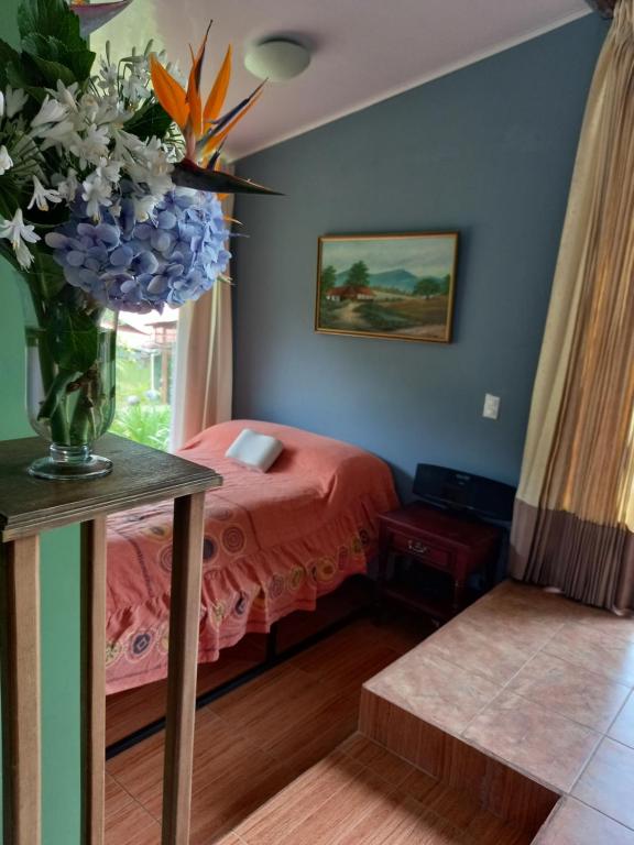 Postel nebo postele na pokoji v ubytování Suite y Loft Casa Toría