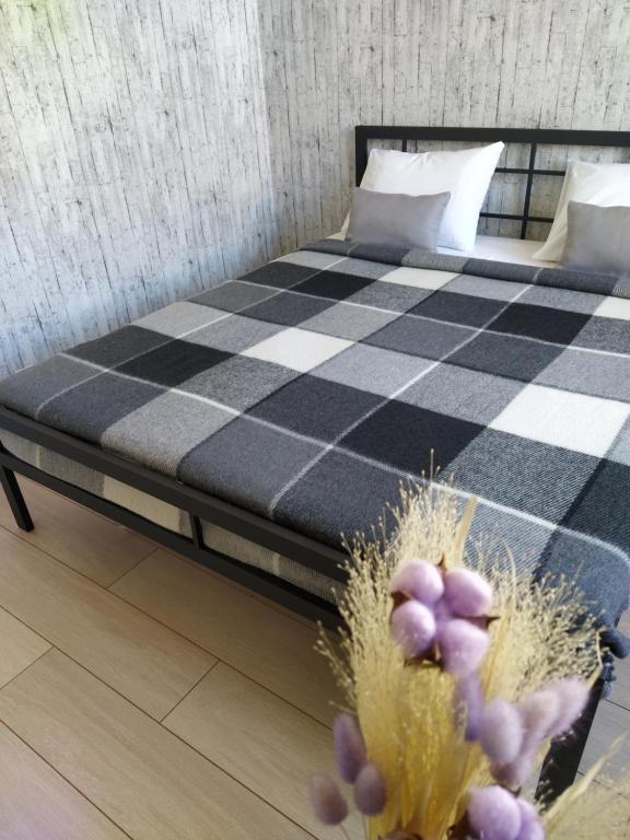 Postel nebo postele na pokoji v ubytování Студійна 3 к кв Центр м Гагаріна м Спортивна