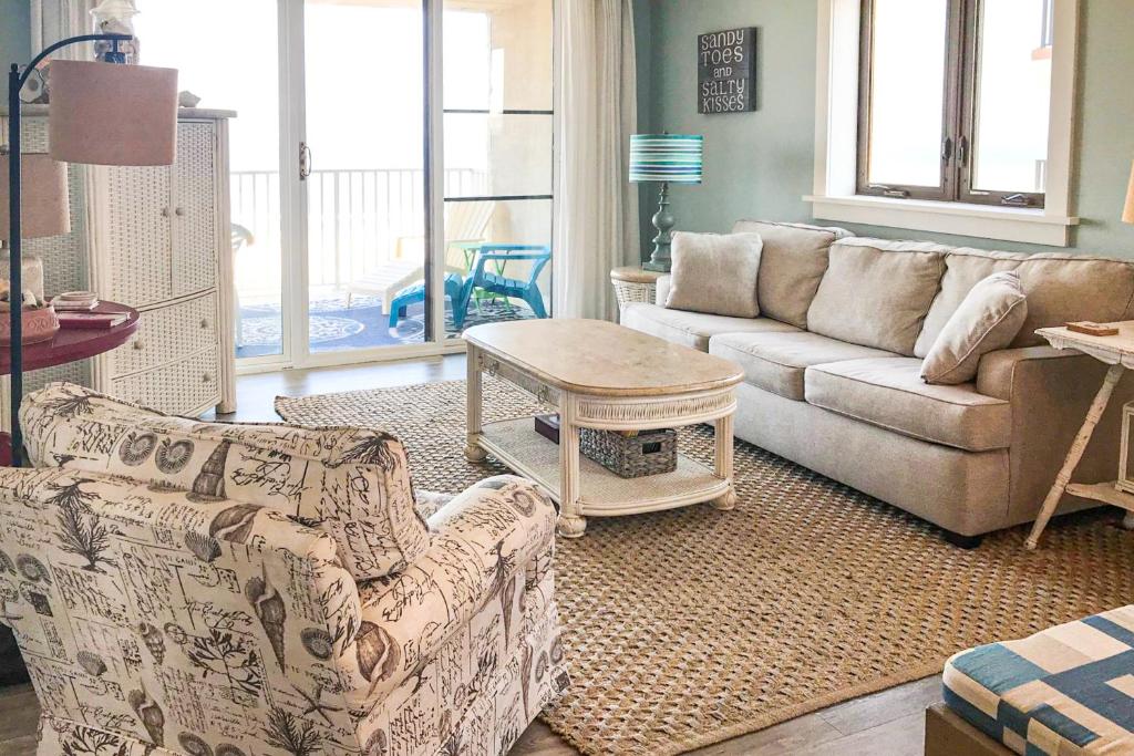 a living room with a couch and a table at Ocean Towers 3A in Ocean City
