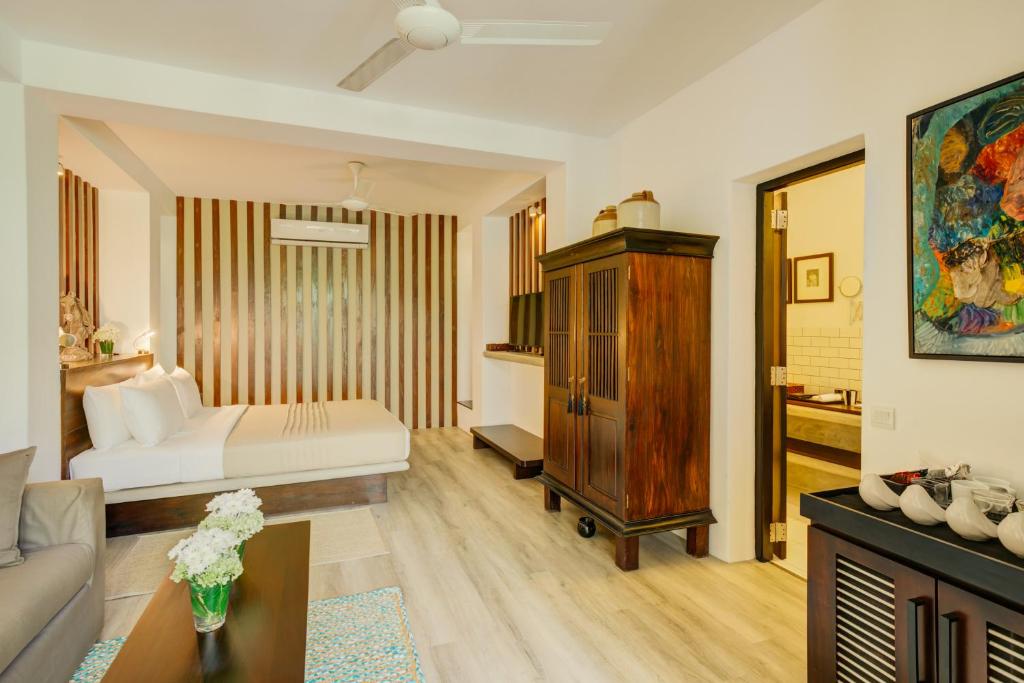 Postel nebo postele na pokoji v ubytování Nyne Hotels Lake Lodge, Colombo
