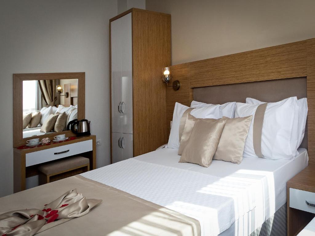 Postel nebo postele na pokoji v ubytování Zeyn Otel Istanbul