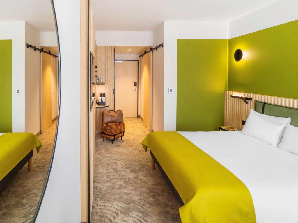 Posteľ alebo postele v izbe v ubytovaní Mercure Katowice Centrum