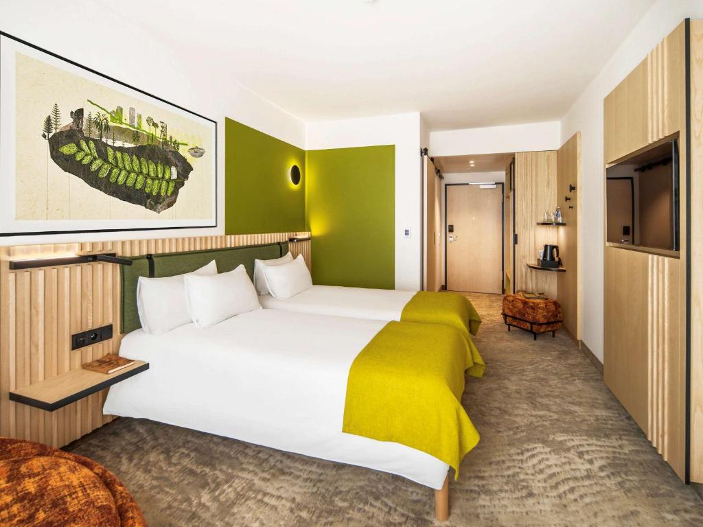 Posteľ alebo postele v izbe v ubytovaní Mercure Katowice Centrum