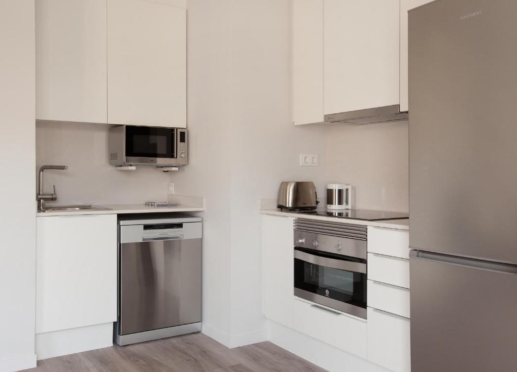 Kuchyň nebo kuchyňský kout v ubytování APBCN Eixample Center