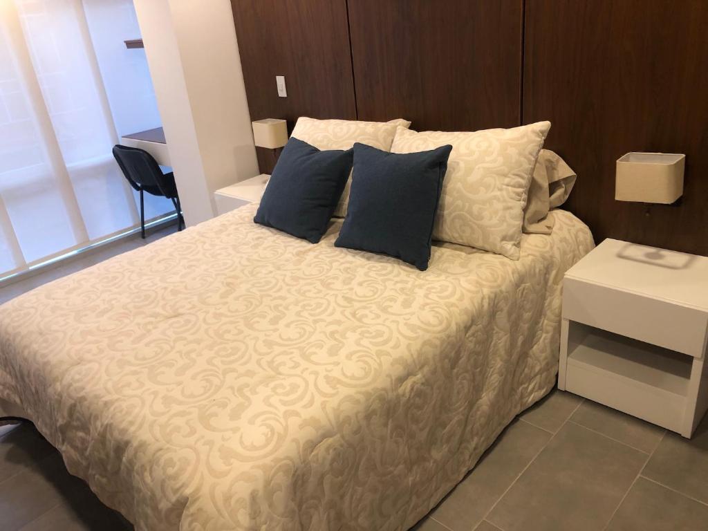 Cama o camas de una habitación en Apartamentos Edificio San Miguel Bogotá