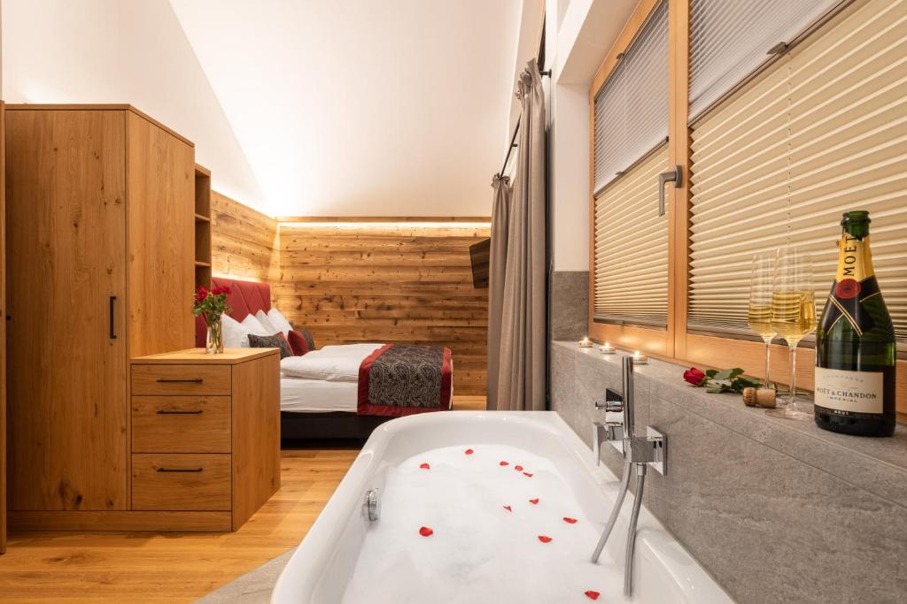 Postel nebo postele na pokoji v ubytování Ferienlodge Edelstein