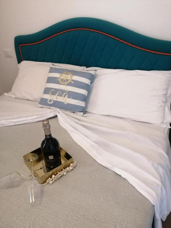 Postel nebo postele na pokoji v ubytování Hotel Riposo