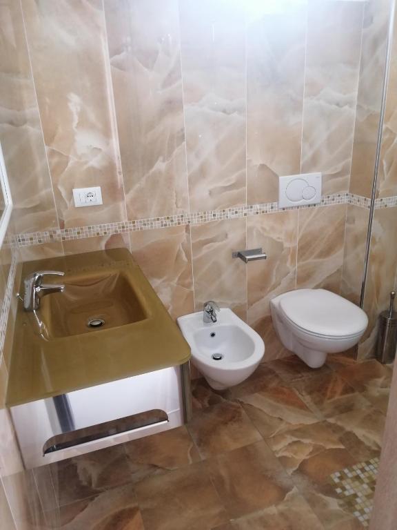 Koupelna v ubytování Hotel Riposo