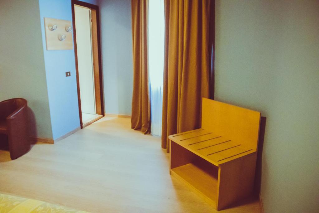 Postel nebo postele na pokoji v ubytování LAERTE PALACE HOTEL