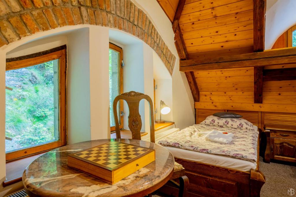Postel nebo postele na pokoji v ubytování Stara Plynarna