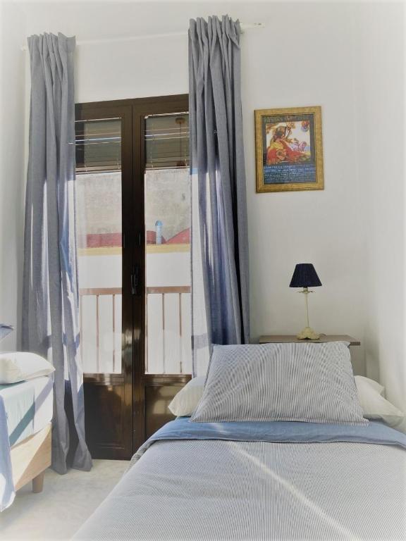 Postel nebo postele na pokoji v ubytování El Envero Apartamento