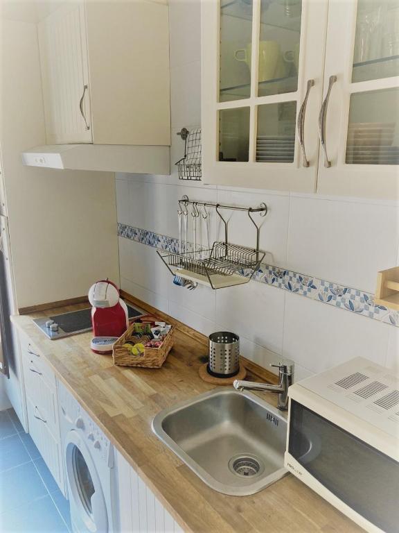 Kuchyň nebo kuchyňský kout v ubytování El Envero Apartamento