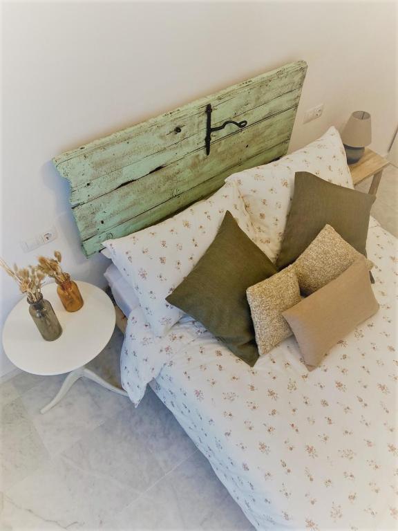 Postel nebo postele na pokoji v ubytování El Envero Apartamento