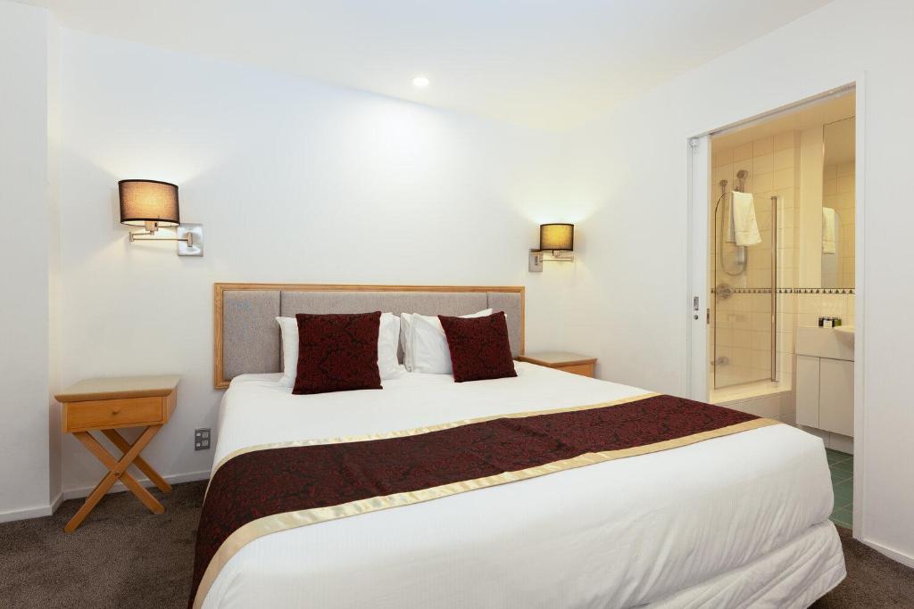 Postel nebo postele na pokoji v ubytování Fino Hotel & Suites