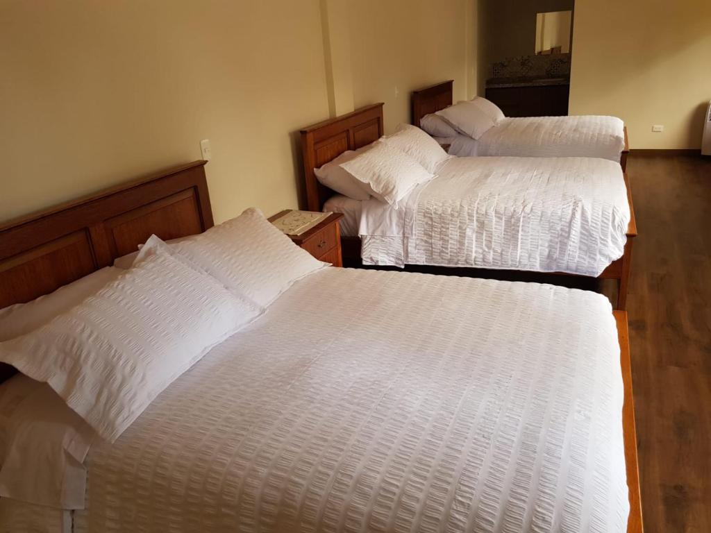 Postel nebo postele na pokoji v ubytování Quinta San Felipe