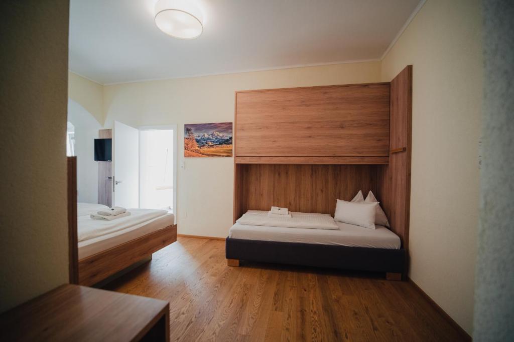 Postel nebo postele na pokoji v ubytování Hotel Restaurant DAS RÖSSL