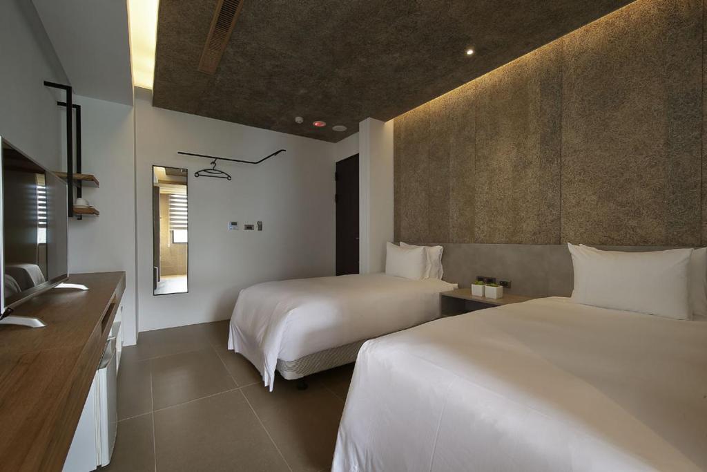 Postel nebo postele na pokoji v ubytování Laurel Villa B&B