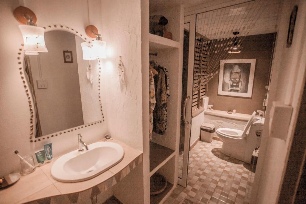 Koupelna v ubytování Cozy Huts