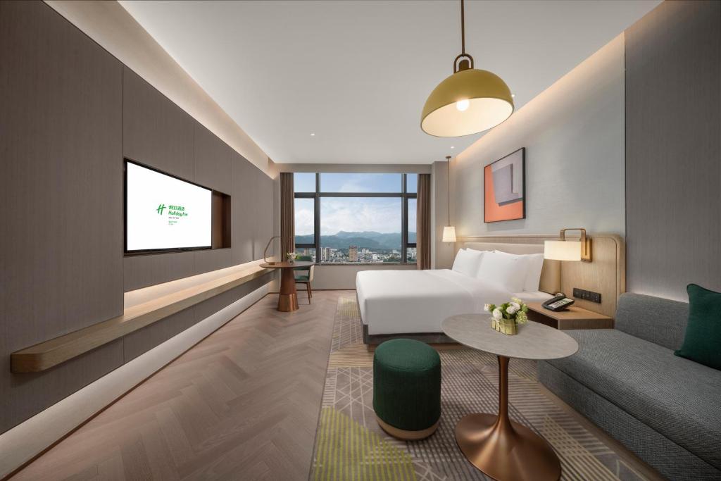 TV a/nebo společenská místnost v ubytování Holiday Inn Fu'an