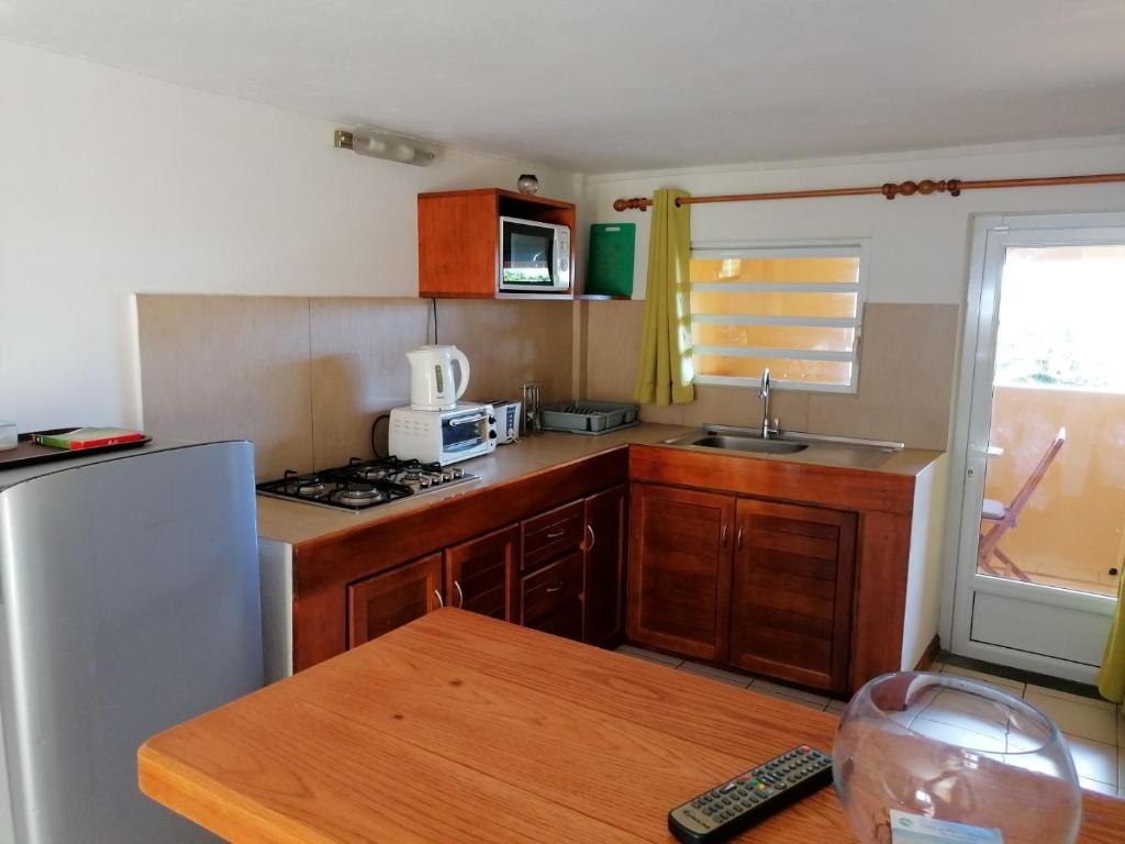 Kuchyň nebo kuchyňský kout v ubytování Terre et Mer - Studios - Ile Maurice
